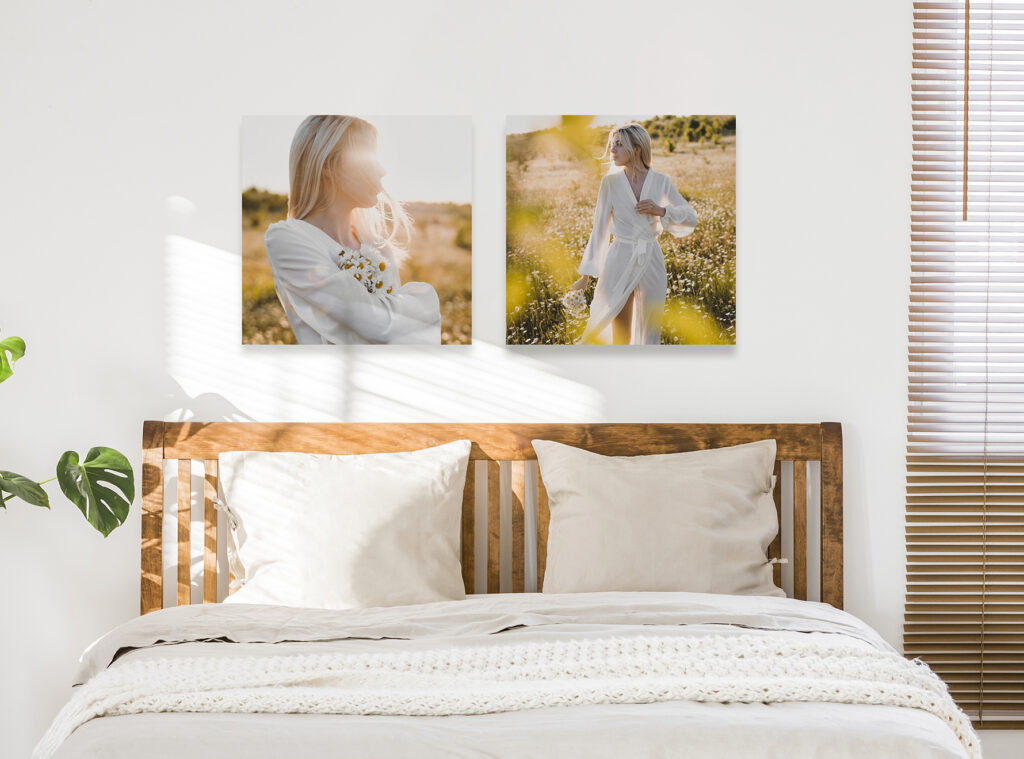 Alu-Dibond oder Acrylglas? Wandbilder hängen über dem Bett.